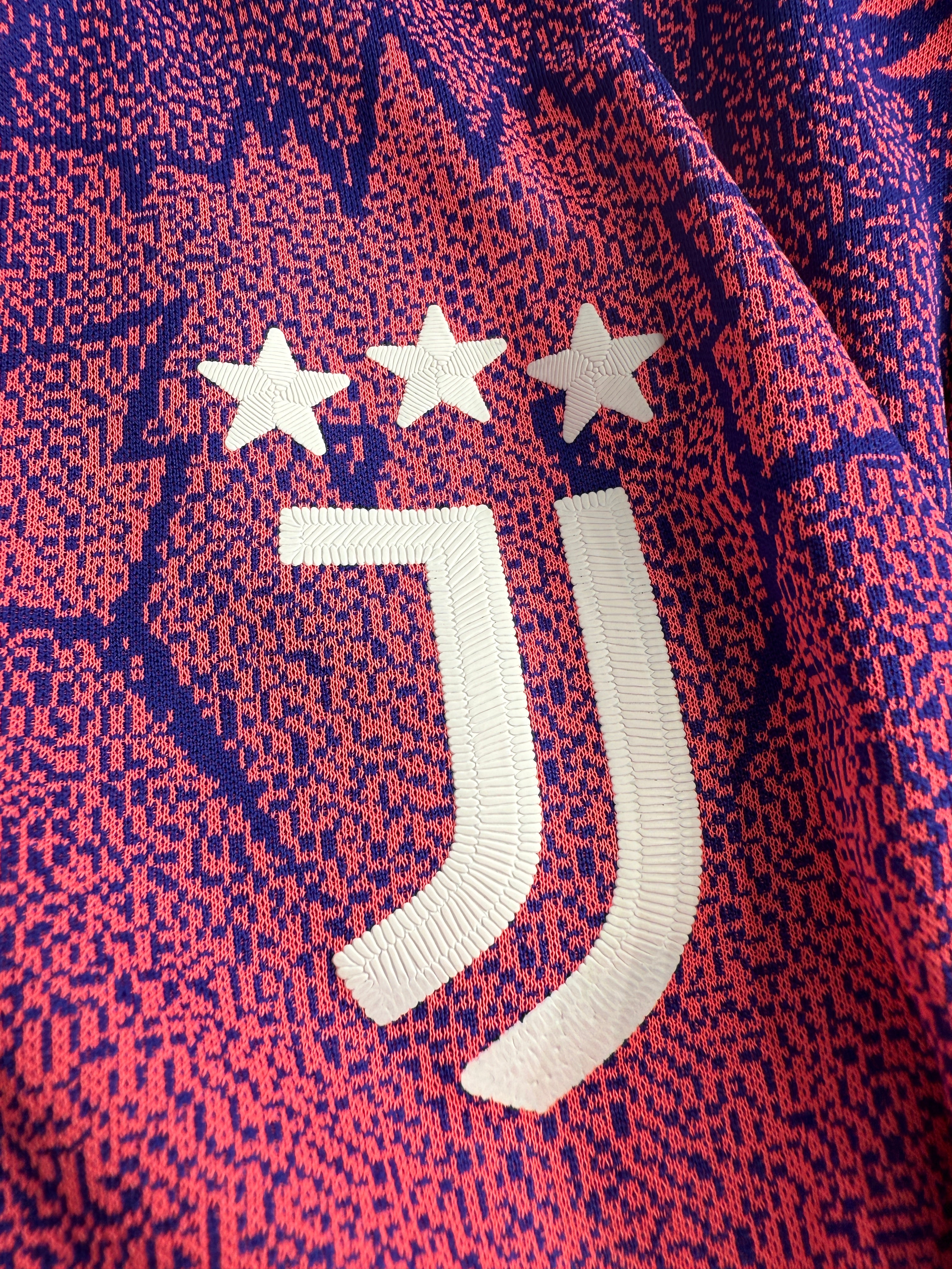 Close-up of a embroidered logo on sports jersey