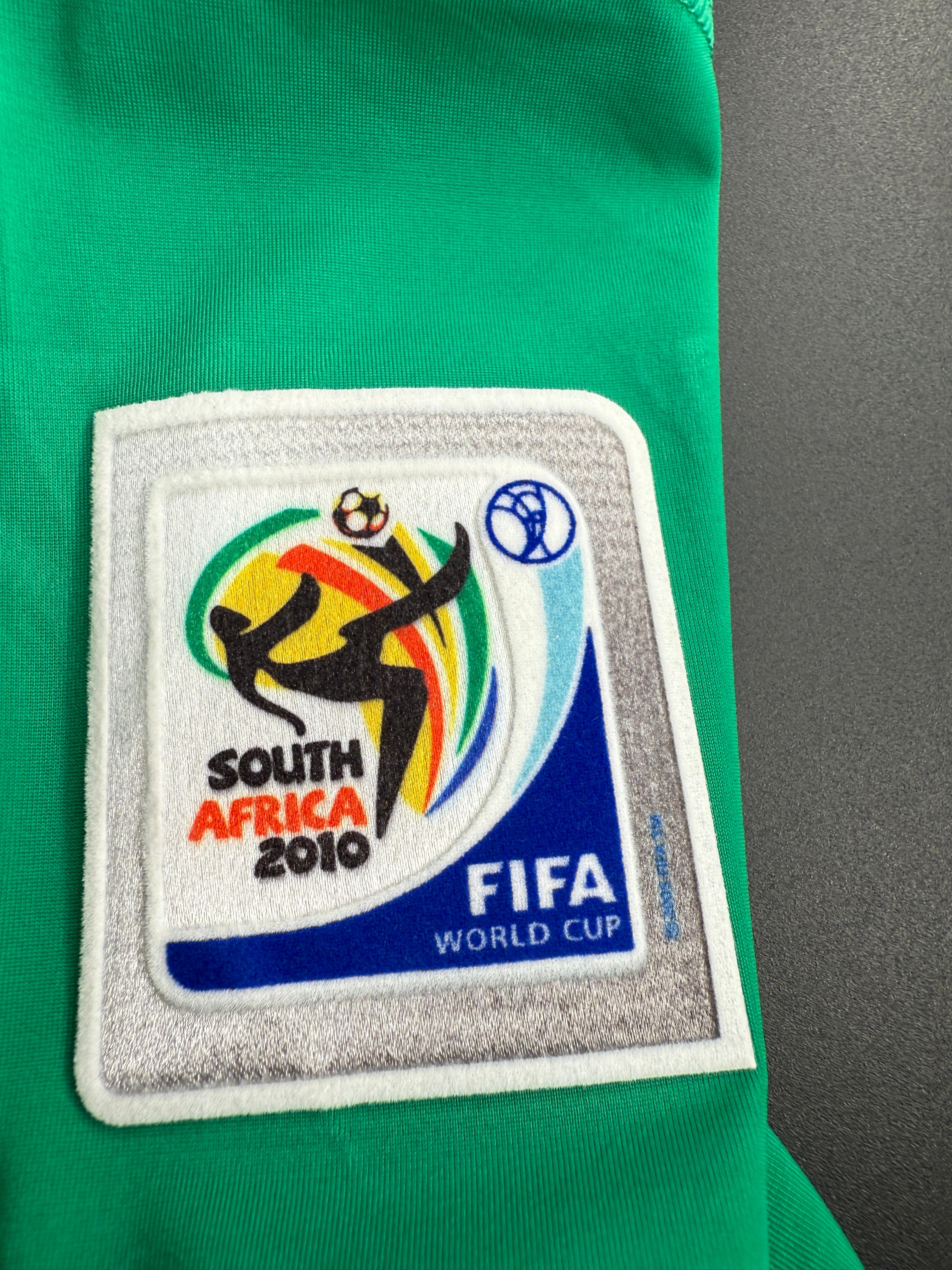 FIFA World Cup 2010 patch on a green fabric background