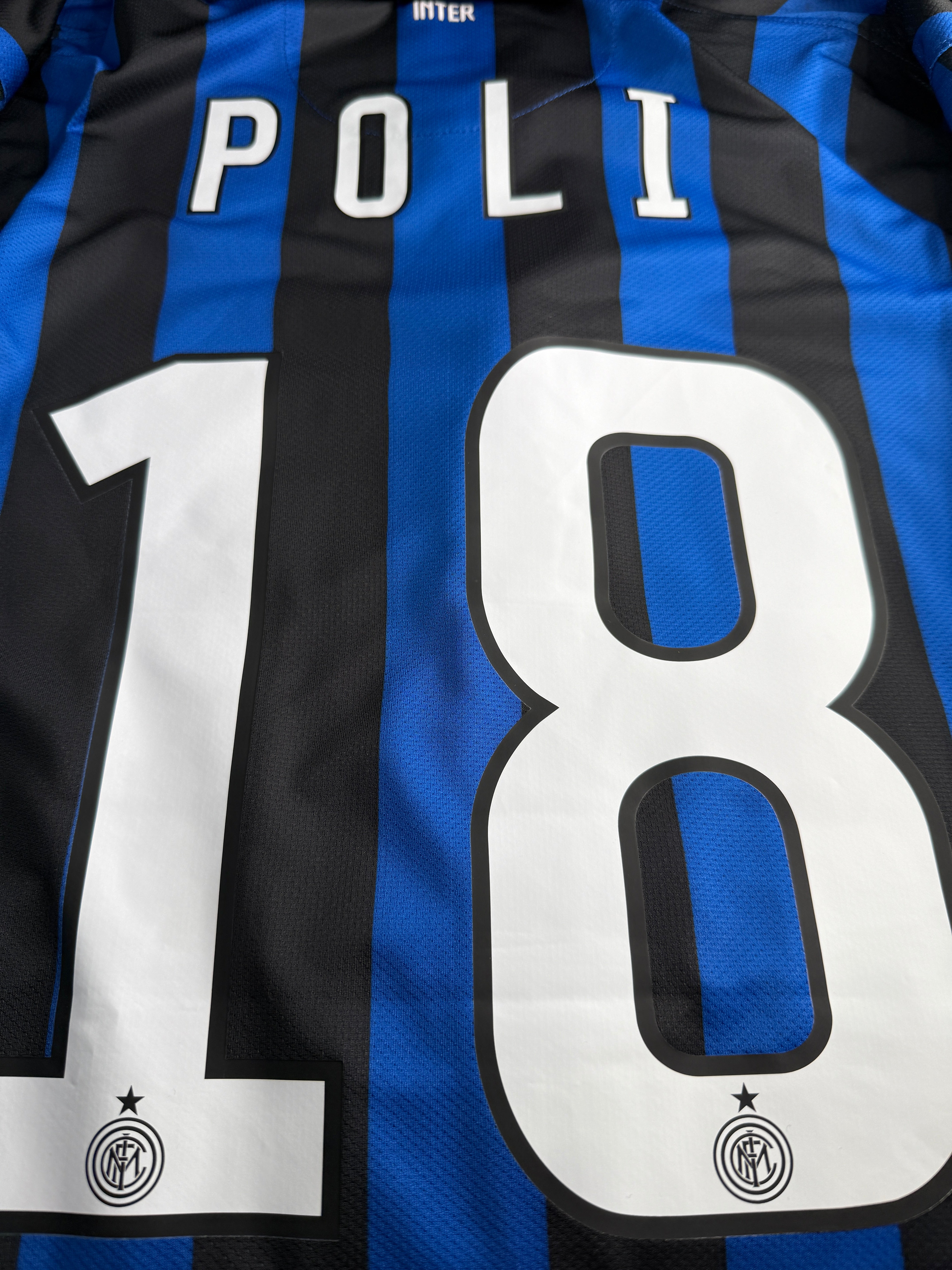 Close-up of a sports jersey with number 8 and namepolo