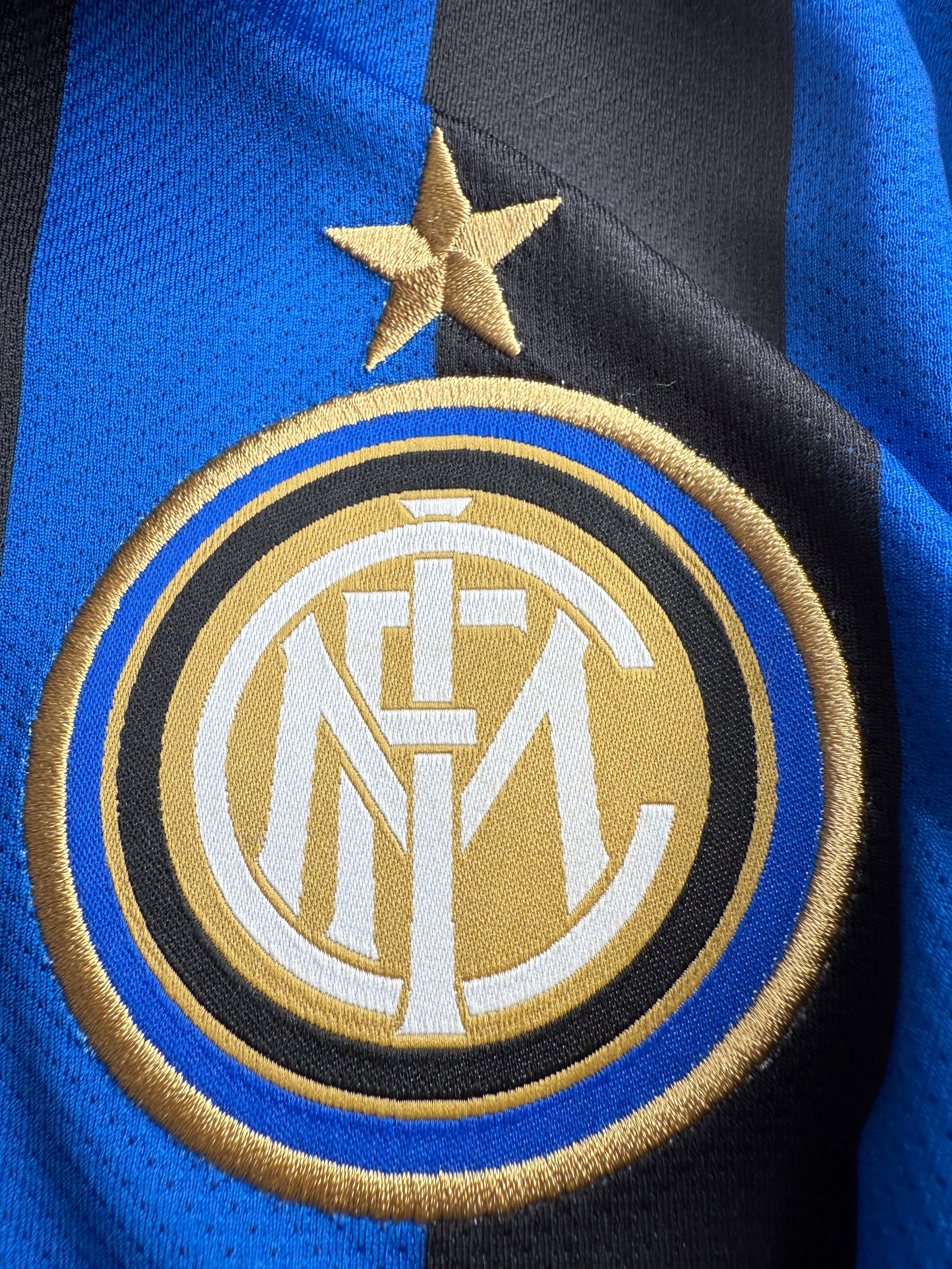 Close-up of a sports team logo on a jersey.