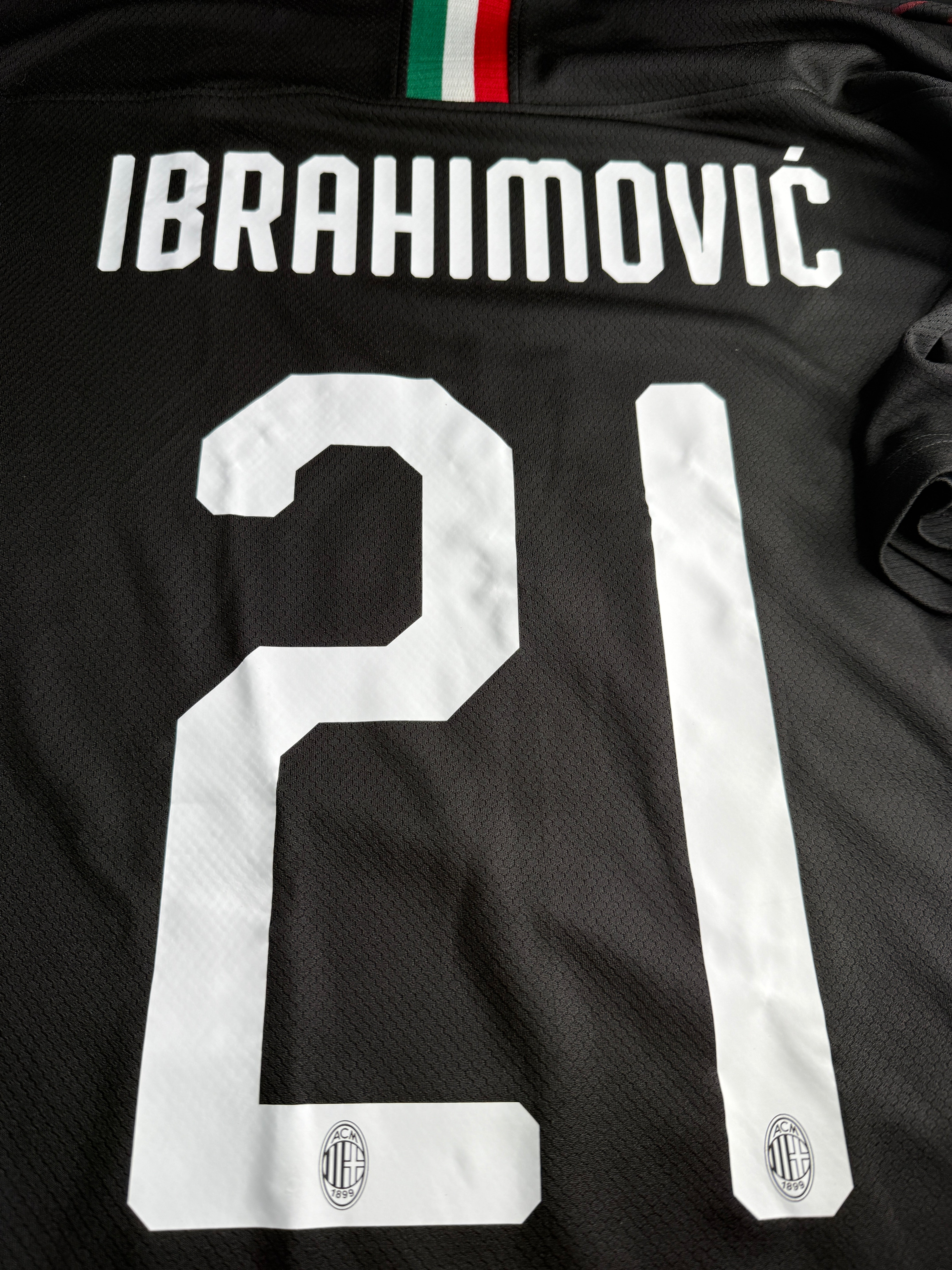 Black sports jersey with 'Brahimovic' and number '5', close-up.