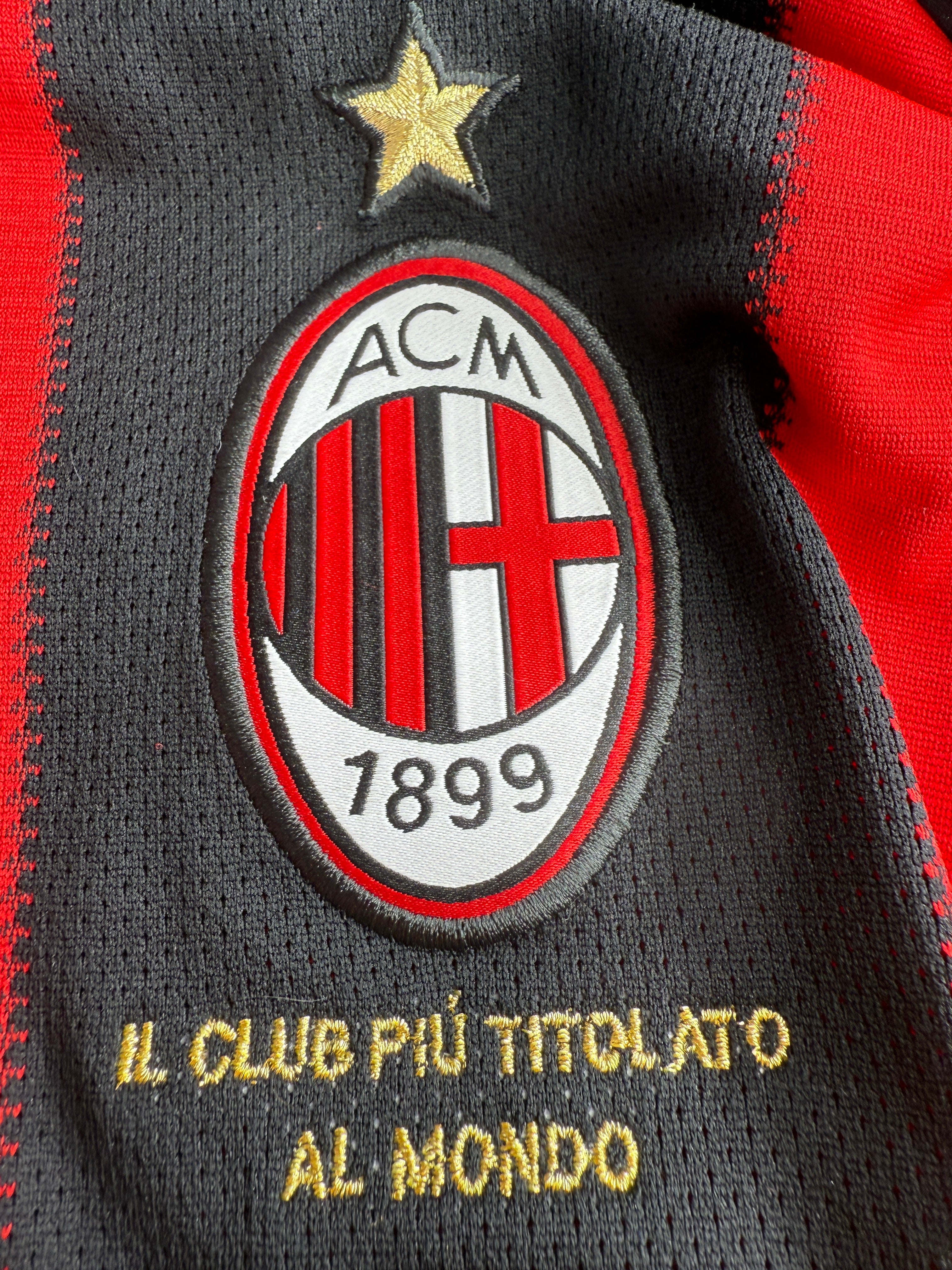 Close-up of a sports team logo and text on a garment.
