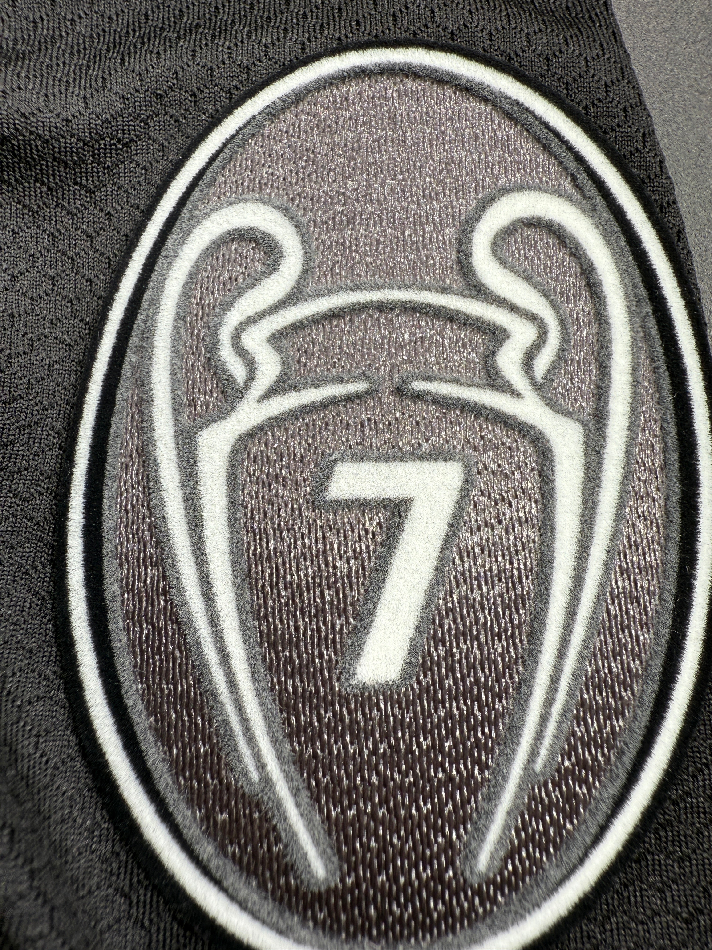 Close-up of a logo on a black background